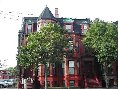 This photograph shows the contextual view of the building, 2005; City of Saint John